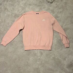 light pink classic nike size small crewneck
